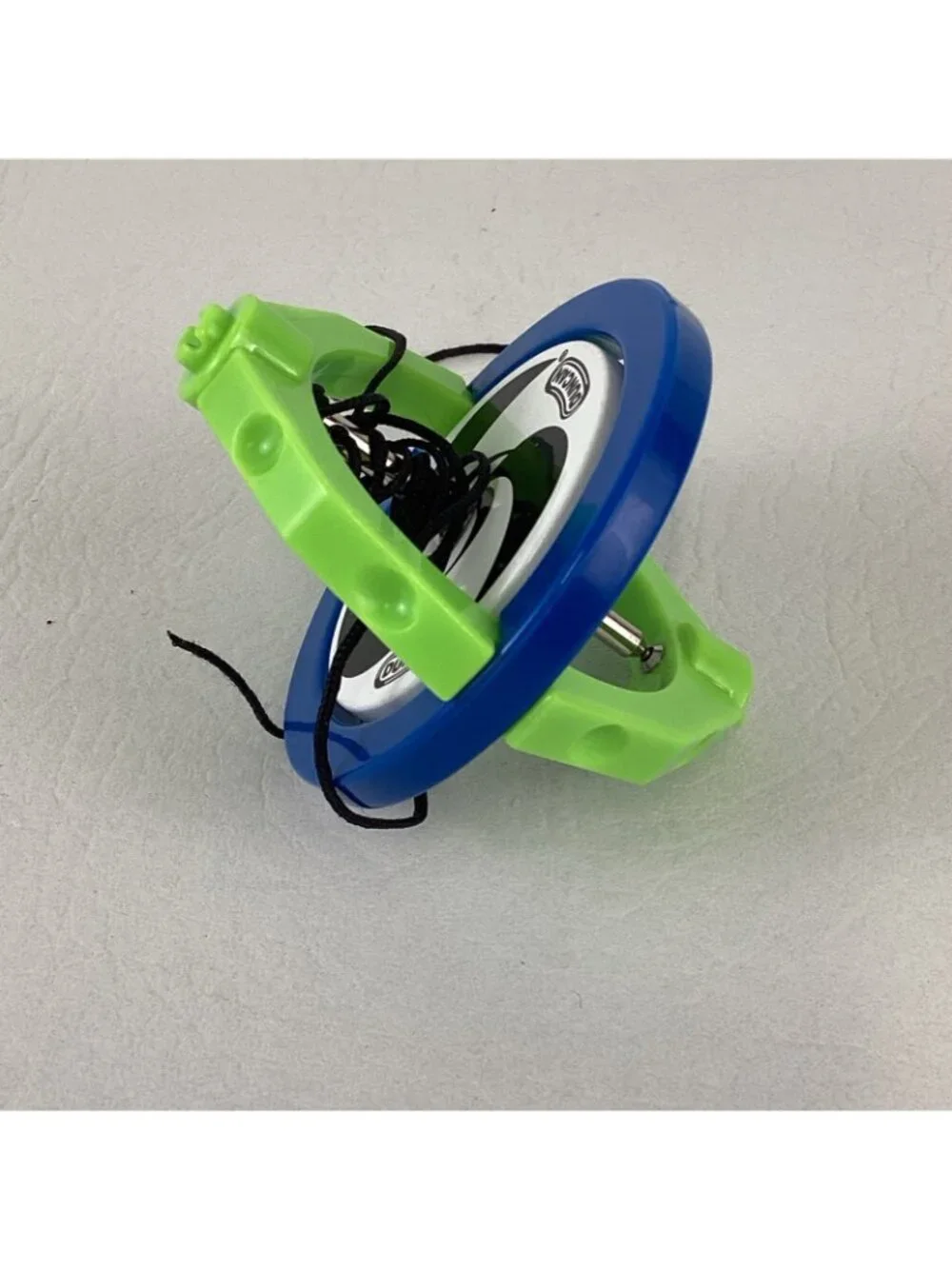 Duncan Gyroscope XT Spinning Top Physics Toy High Speed Green Pocket Trick Book